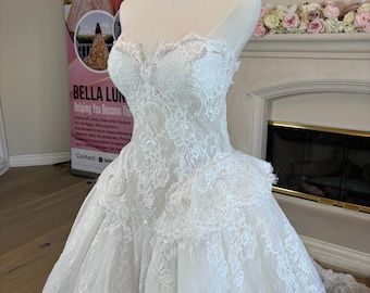 Off shoulder lace bridal ball gown with Sweetheart neckline and pearl beading
