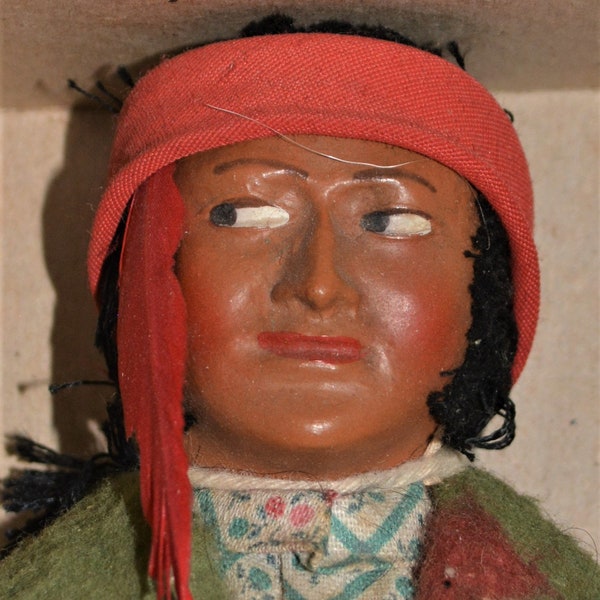 Wonderful yarn hair Skookum Native American doll  tied in orig. Minnehaha Moccasin box, un-played with condition with original feather