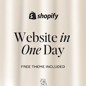 May include: A promotional graphic with the Shopify logo and the text "Website in One Day." The phrase "Free Theme Included" is also displayed. The background is a soft, neutral color.