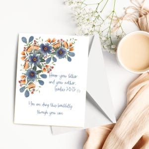 May include: Greeting card with a floral design in shades of blue, orange, and green. The card includes the text "Honor your father and your mother. Exodus 20:12 ESV" and "You are doing this beautifully through your care."