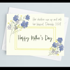 May include: A light yellow card with a blue and yellow floral design. The card has a gold frame with the text "Happy Mother's Day" inside. The card also has the text "Her children rise up and call her blessed. Proverbs 31:28"