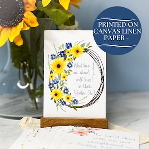 May include: A white card with a watercolor illustration of a sunflower wreath. The card has the text "What time I am afraid, I will trust in thee. Psalm 56:3". The card is printed on canvas linen paper.
