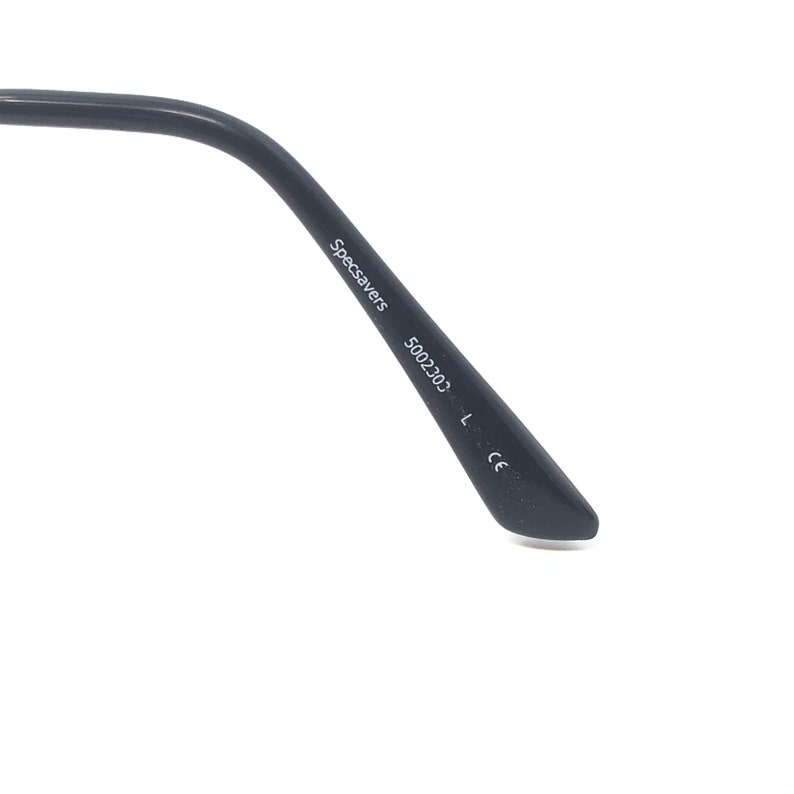 May include: Close-up of the arm of a pair of black eyeglasses. The text "Specsavers" and "5002303 L CE" is printed on the arm. The glasses arm is angled and has a rounded tip.