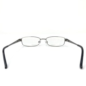 May include: Rectangular eyeglasses with a silver metal frame and dark gray temples. The lenses are clear, and the glasses are set against a white background. The glasses are designed for vision correction.
