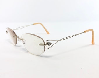 Vintage Lunettes de vue Specsavers Monture de lunettes ovale sans monture argentée Retro