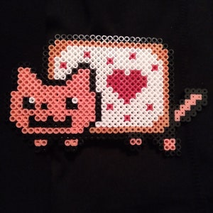 Perler Bead Nyan Cat · A Pegboard Bead Charm · Art, Photography, and  Beadwork on Cut Out + Keep