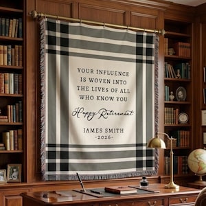May include: A set of three ceramic mugs with a speckled, cream-colored glaze. Each mug features a different hand-painted design: a blue and green leaf, a yellow flower, and a red berry. The mugs have a simple, rounded shape.
