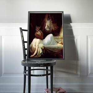May include: A framed painting depicting a woman sleeping in a bed with a demonic figure hovering over her. The painting is set in a dark room with a single candle illuminating the scene.