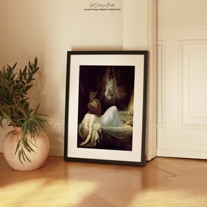 May include: A framed print of a vintage painting depicting a woman sleeping in a bed with a shadowy figure standing over her. The painting is set in a dark room with a single candle burning on a table.