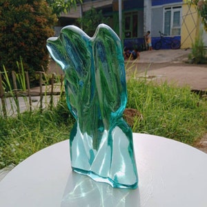 New item !! 2340 gr perfect shape and luxurious turquoise green that shines beautiful relief on the full polished surface of andara crystals