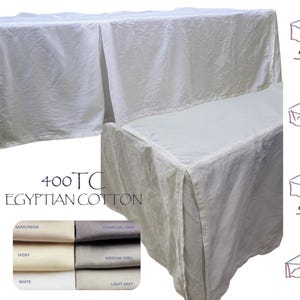 May include: White 400TC Egyptian cotton table skirt with a pleated design. The image shows the skirt draped over a table, with a close-up of the fabric texture. Additional color swatches and table skirt style options are also displayed.