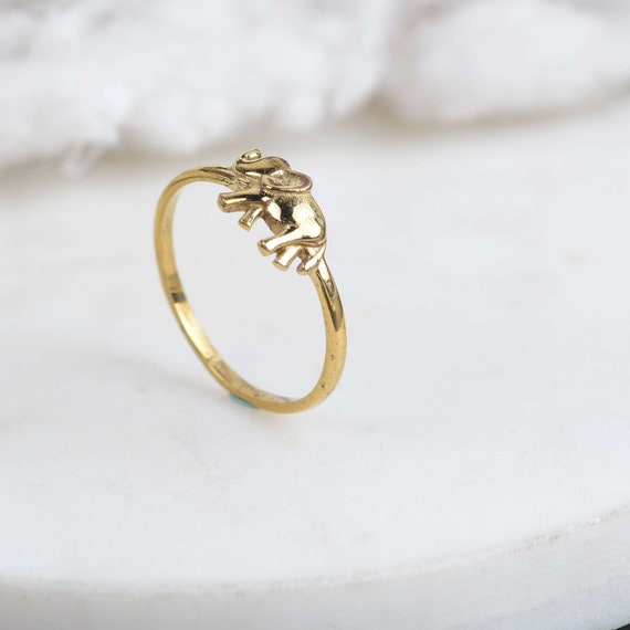 12 Ways to Wear an Elephant Ring. As a woman, elephant ring gold can be a…  | by Jahda Jewelry | Medium
