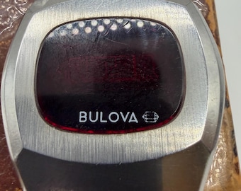 Bulova Computron steel wrist watch.
