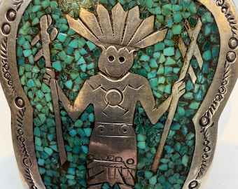 Kachina silver brooch.