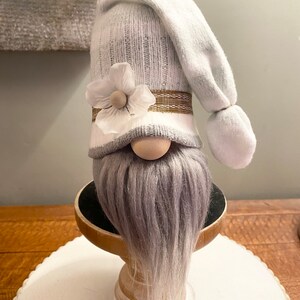 Teal and Grey Gnome With Flower