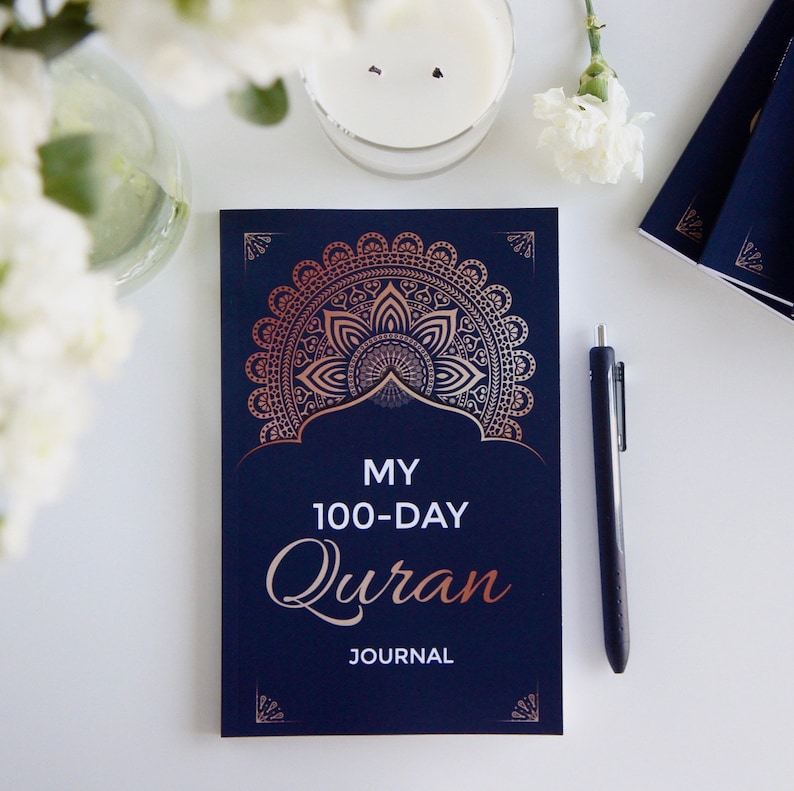 May include: A navy blue journal with a gold mandala design and the text "MY 100-DAY Quran JOURNAL".