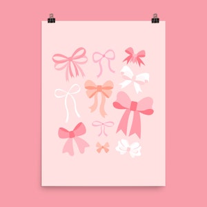 May include: A digital illustration of pink, peach, and white bows on a light pink background.