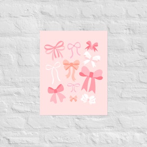 May include: A pink background with various pink, white, and peach bows of different sizes and shapes.