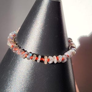 Bracelet made of natural gray labradorite stones on coral silk thread. Women&#39;s/Men&#39;s bracelet. Gift for her.