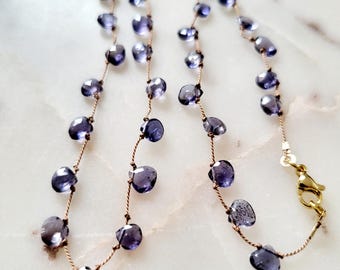 Necklace made of natural blue-grey iolite stones on silk thread, small pear. Women's necklace, delicate minimalist fine necklace.