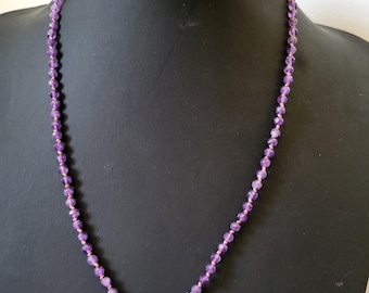 Minimalist fine necklace with natural purple amethyst stones on pink silk thread. Pink sapphire pendant, delicate and minimalist.