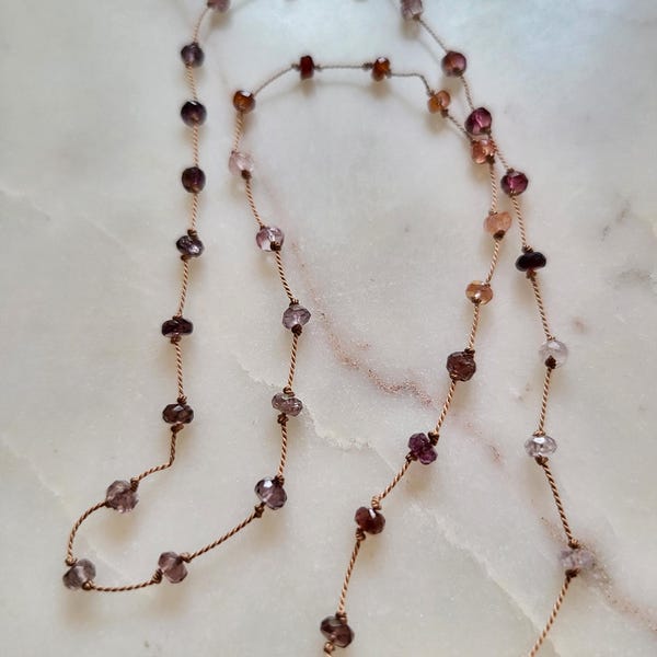 Necklace of natural pink multi-spinel stones knotted on a pink silk thread. Delicate minimalist fine necklace for women.