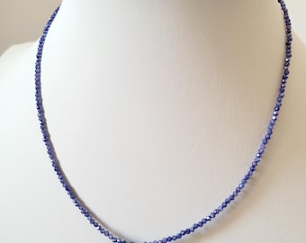 Necklace made of blue-violet colored zirconium oxide tanzanite, heated blue sapphire, 925 silver;