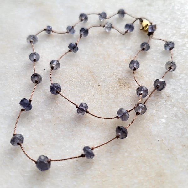 Necklace of natural blue iolite stones knotted on brown silk thread. Delicate, minimalist necklace. Necklace for women.