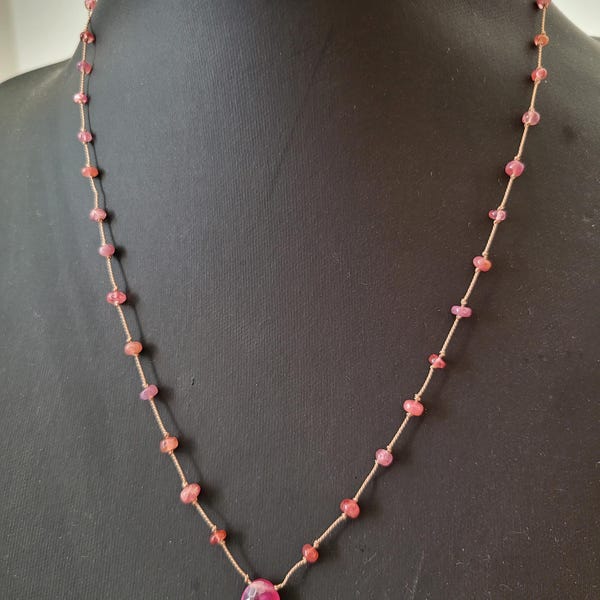 Necklace of smooth pink tourmaline natural stones, long necklace of stones knotted on silk thread, pink heated sapphire pendant.