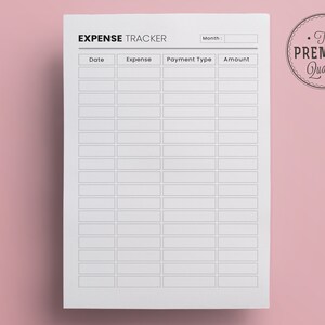 May include: A white expense tracker sheet with black text and lines. The top of the sheet reads "EXPENSE TRACKER" and includes fields for "Date", "Expense", "Payment Type", and "Amount". A circular "The PREMIUM Quality" sticker is in the upper right corner.
