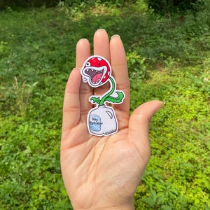 Sticker plante piranha dessin animé