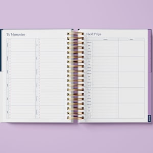 May include: An open planner with a blue cover and gold spiral binding. The left page has the heading "To Memorize" and the right page has the heading "Field Trips".