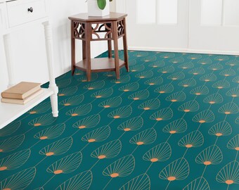 May include: Teal and gold geometric patterned rug with a repeating design of stylised leaves. The rug is laid out on a hardwood floor in a home hallway.