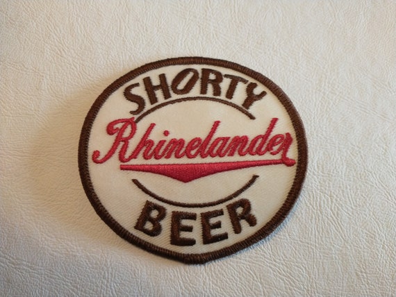 Vintage ADVERTISING PATCH OLYMPIA GOLD BEER 4" OVAL New Old Stock NOS condition