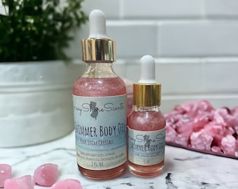 Aceite corporal brillante con cristales de azúcar rosa