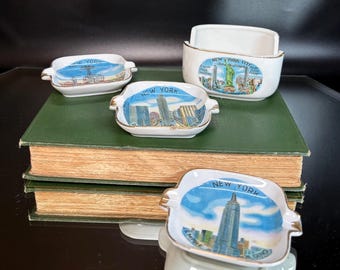 Ceniceros de cerámica vintage de los años 50 con monumentos de Nueva York en estuche.