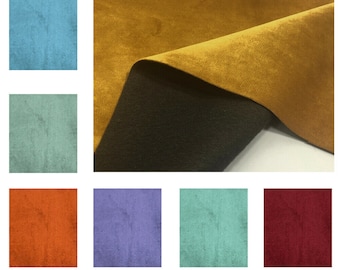 May include: A collection of fabric swatches in various colors, including navy blue, beige, mustard yellow, forest green, light blue, sage green, orange, lavender, mint green, and burgundy. The swatches are arranged in a grid pattern.