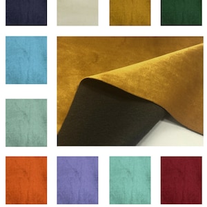 May include: A collection of fabric swatches in various colours, including navy blue, beige, mustard yellow, forest green, light blue, sage green, orange, lavender, mint green, and burgundy. The swatches are arranged in a grid pattern.