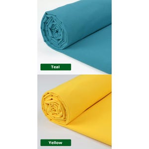May include: Two rolls of fabric, one teal and one yellow, are displayed. The teal fabric is labeled "Teal" and the yellow fabric is labeled "Yellow". The fabric is rolled up, showing the texture and color of the material.