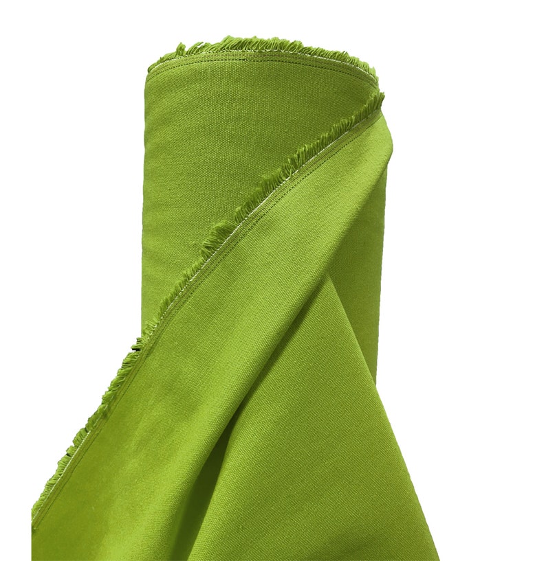May include: A roll of bright green fabric with a fringed edge.