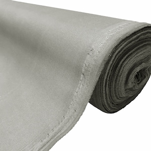 May include: A roll of gray fabric with a stitched edge. The fabric is rolled up tightly and the end of the roll is visible.