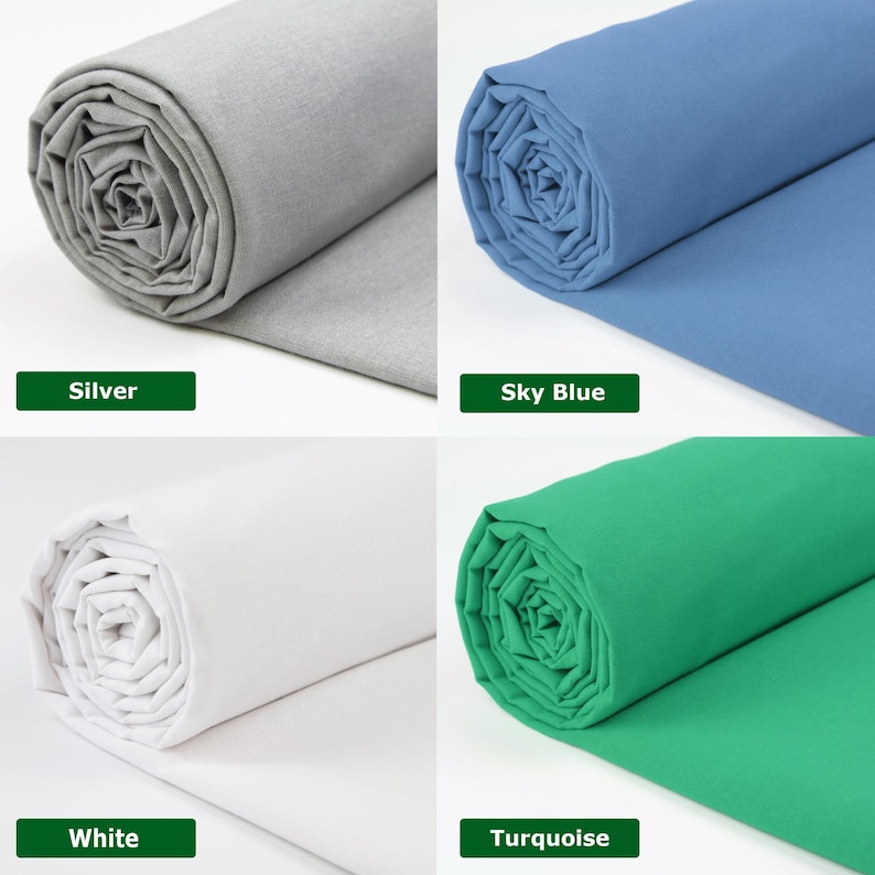 May include: Four rolls of fabric in silver, sky blue, white, and turquoise. Each roll is labeled with its color name in a green rectangle. The fabric is tightly rolled, showing the texture and color variations.