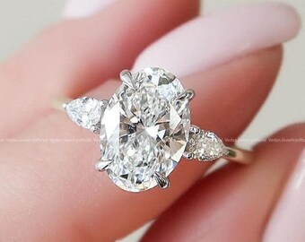 3 Carat Oval Moissanite Engagement Ring with Pear Side Stones