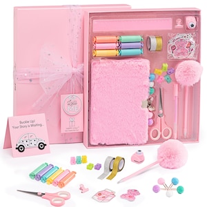 May include: A pink gift set with a fluffy journal, pens, scissors, stickers, and colorful accessories. The set includes a pink box tied with a sheer ribbon and a card that says "Buckle Up! Your Story is Waiting..."