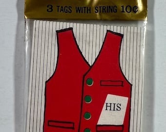 May include: A package of three Hallmark gift tags featuring a red vest illustration on a white background with thin black vertical stripes. The vest has four green circular buttons and a white pocket square with the black text HIS printed on it.