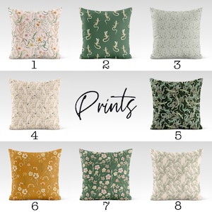 May include: Eight different pillow designs with various floral and animal prints. The prints include green and white floral, green and brown floral, green and white lizard, green and brown lizard, green and white leafy, green and pink floral, yellow and brown floral, and green and white leafy. The pillows are numbered 1 through 8.