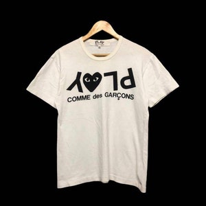 Comme des garcons play reflect logo spellout feito no japão tamanho M