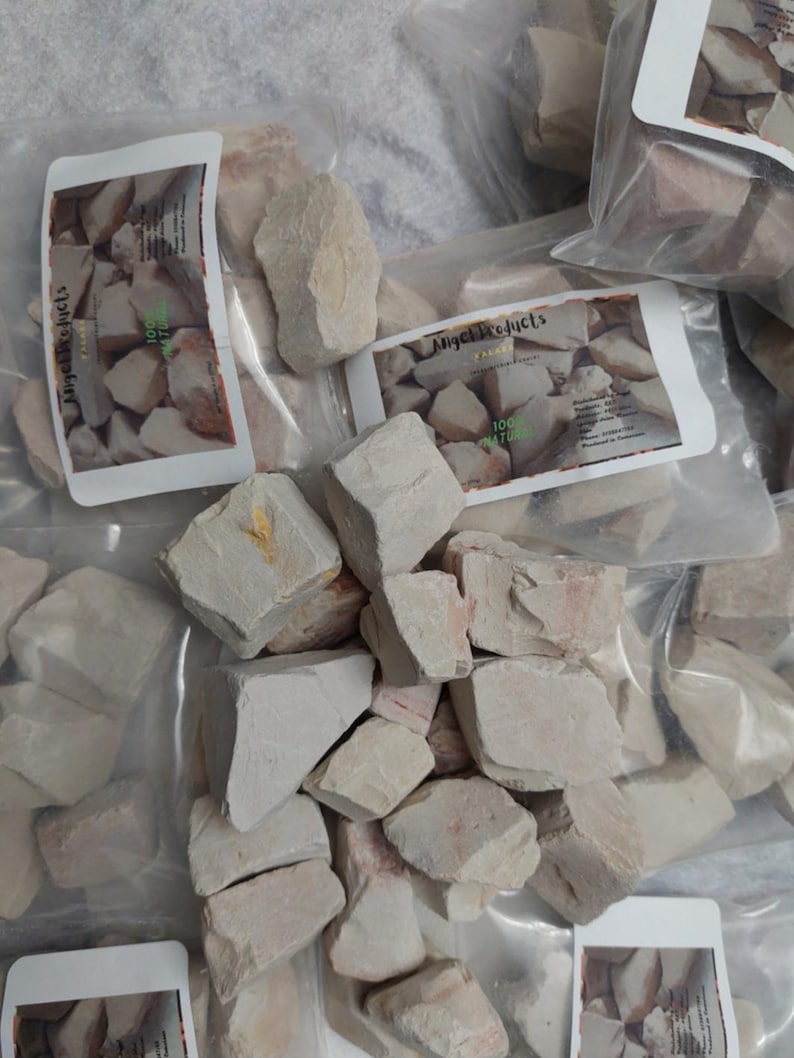 May include: Multiple bags of white clay chunks, labeled "Angel Products" and "100% Natural".