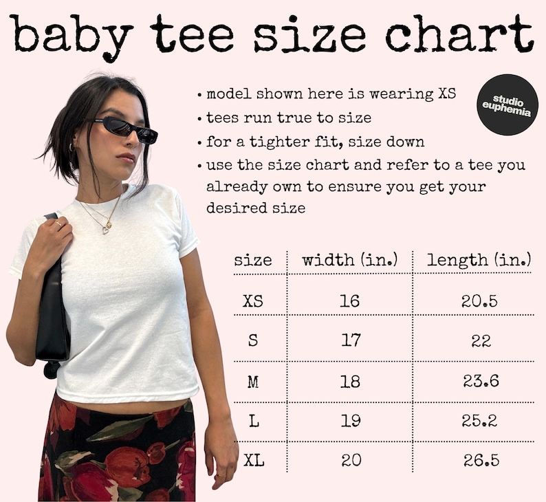 May include: A white baby tee size chart with measurements in inches. The chart includes sizes XS to XL, with corresponding widths and lengths. The model is wearing an XS. The text says "tees run true to size".