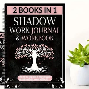 May include: A spiral-bound journal and workbook titled "SHADOW WORK JOURNAL & WORKBOOK" with a black cover. The cover features a white tree design with pink leaves and the text "2 BOOKS IN 1". The journal's subtitle reads, "The step-by-step guide to embracing your darkside and living a more fulfilling life."
